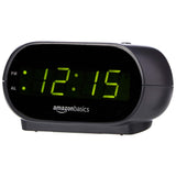 Amazon Basics Oval Digital Clock with Nightlight – Clean-Design Bedside Clock for Less-Is-More Homes