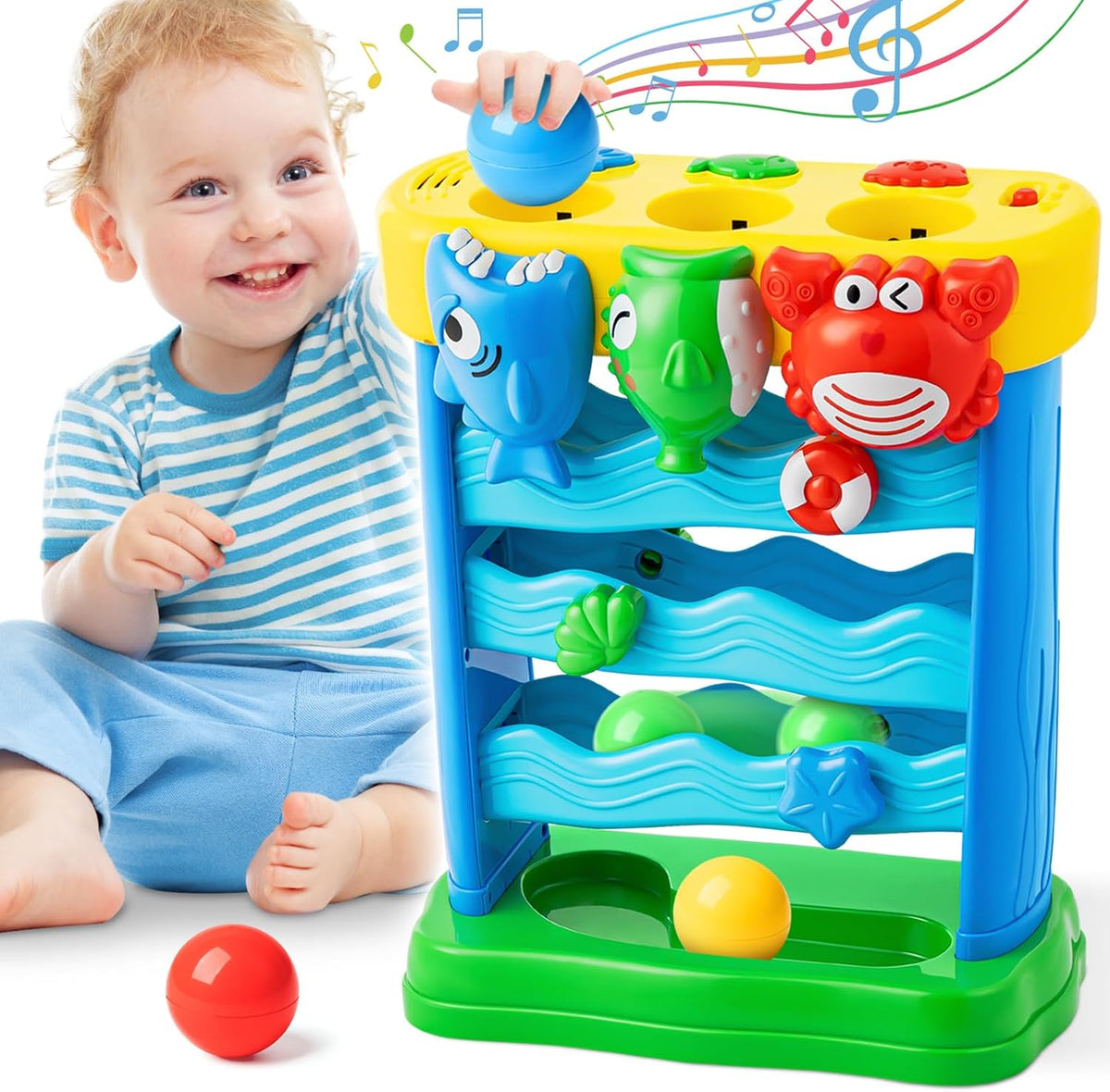 3-animal feeding mechanism (shark, pufferfish, crab) that responds with sounds, animal introductions, and songs when a ball is inserted