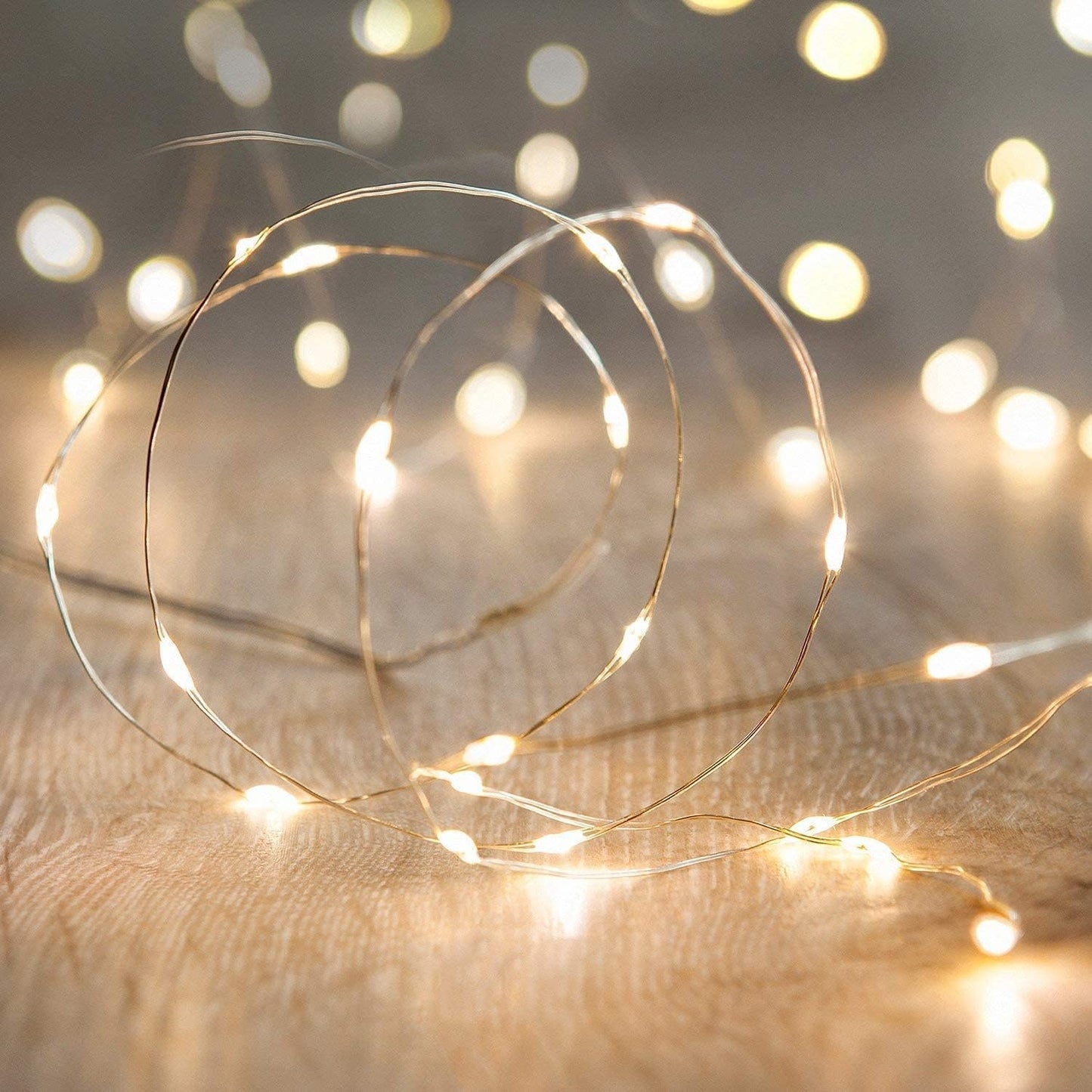 30 (or 60) super bright warm white leds on a single silver ultra-thin copper wire with 4-inch bulb spacing