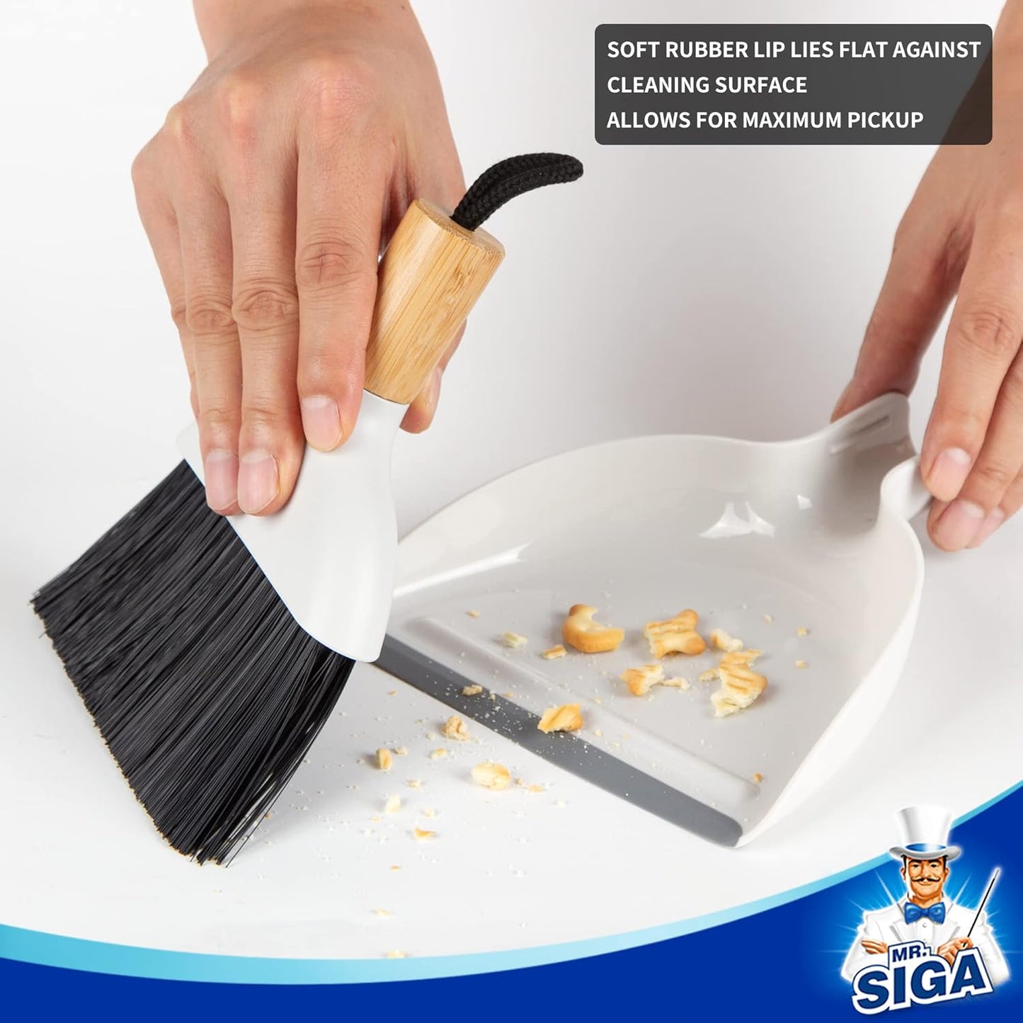 built-in raised debris-catching bar on the dustpan edge