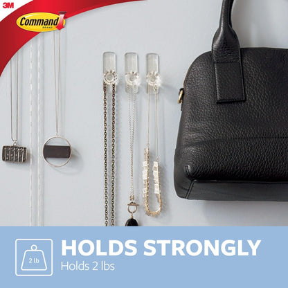 command adhesive strips deliver damage-free hold on painted walls, wood, glass, tile, and metal