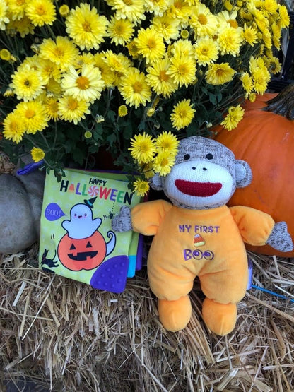 embroidered 'my first boo' message and embroidered facial details (no hard plastic parts)