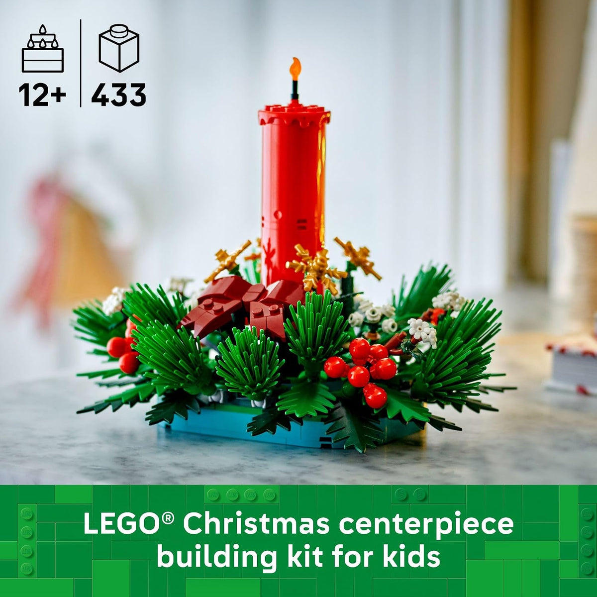 features a red brick-built candle surrounded by red berries, golden stars, and green foliage