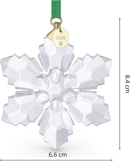 gold-tone plated metal tag engraved with the year (2026) and accented with a small chaton