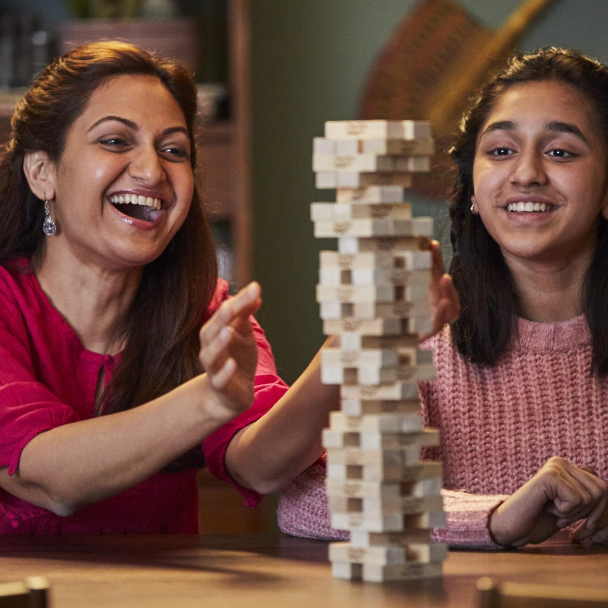 Hasbro Gaming Jenga Wood Block Stacking Game – Thoughtful Housewarming and Holiday Stocking Stuffer for Ages 6 and Up
