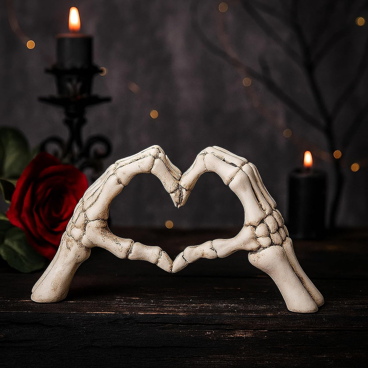 intricately detailed skeleton hand forming a heart gesture with polished finish