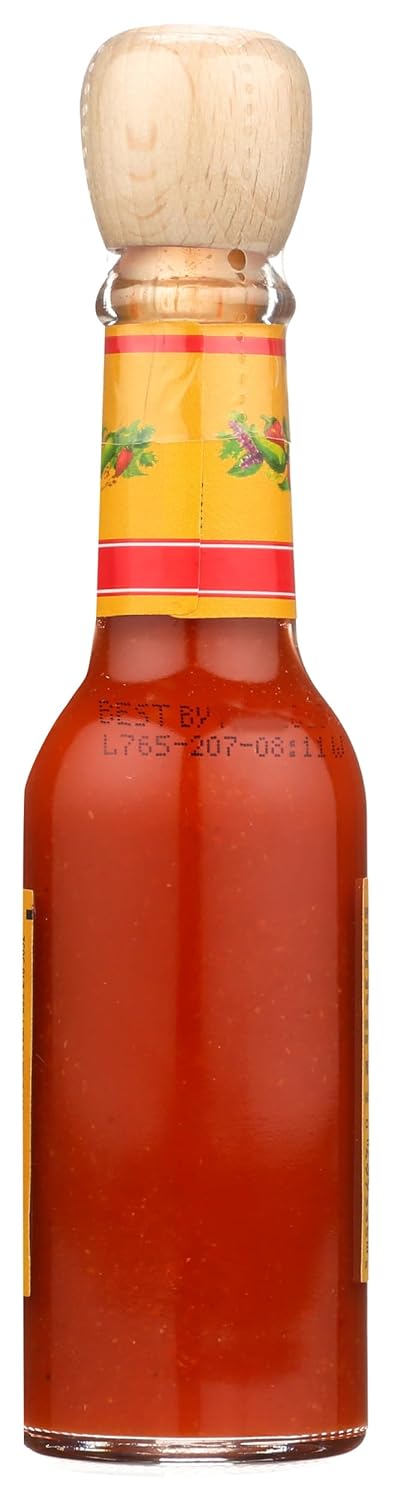 made with arbol and piquin peppers for layered heat