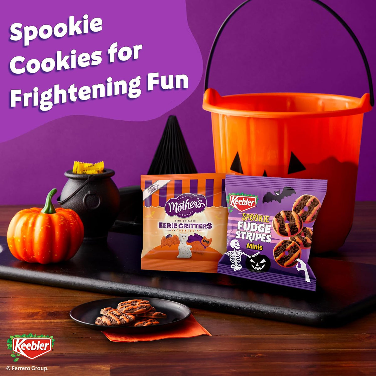 mother's eerie critters bite-size shortbread cookies with orange and white frosting and black-and-orange sprinkles