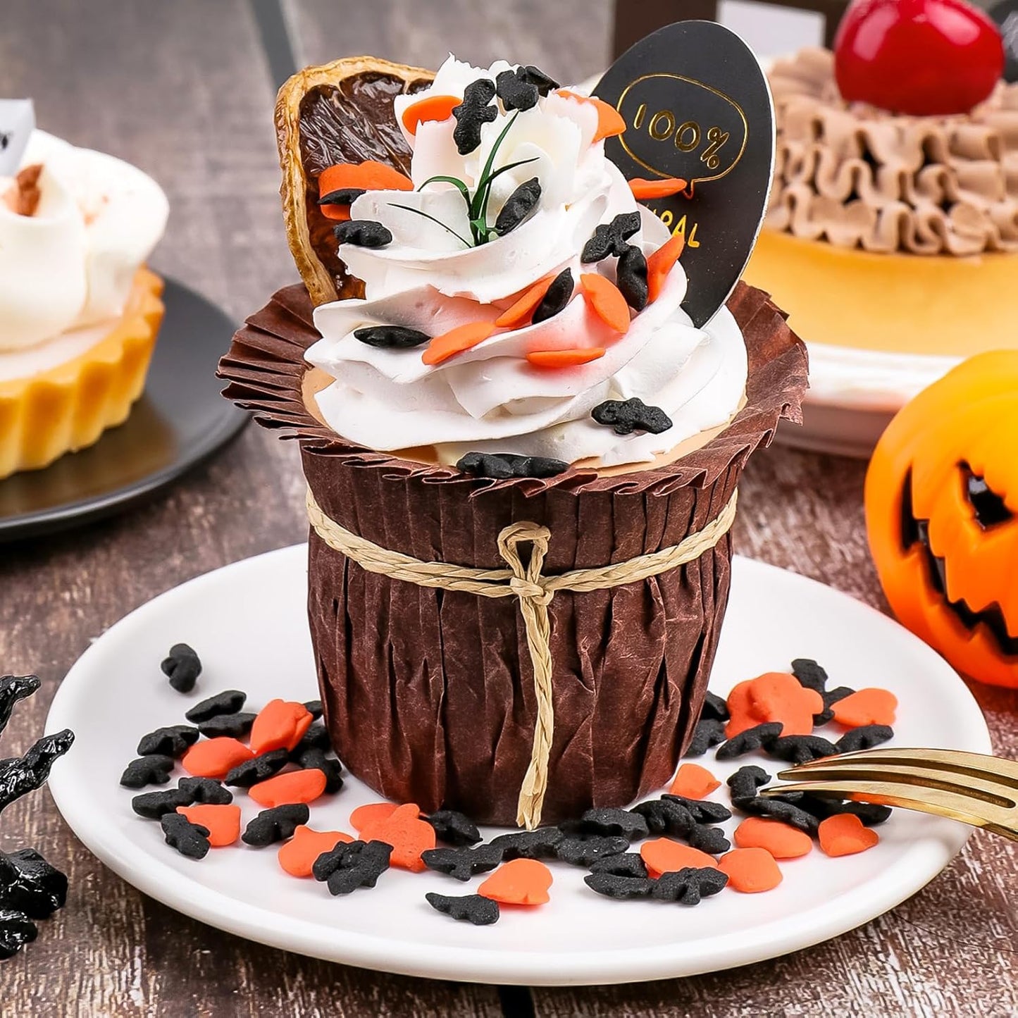 pumpkin-shaped flat sprinkles that lie flat on iced surfaces