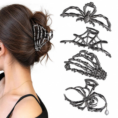 set of 4 hair clips with spider, spider web, and skeleton hand designs