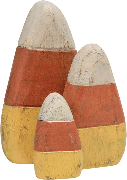 set of three wooden candy corn shapes in graduated sizes (3", 4.75", 5.75" tall)