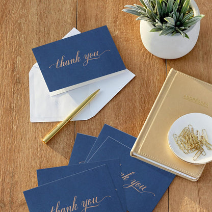 silver foil or gold foil script lettering on navy cardstock