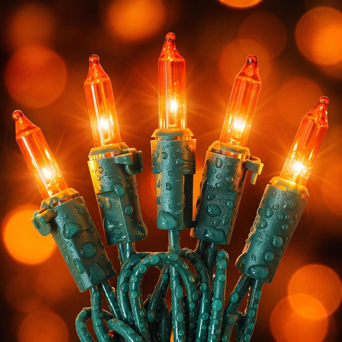 the product line includes 35-light and 50-light versions, with the featured orange and green-wire configuration measuring 13 feet and containing 50 lights